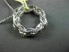 ESTATE .98CT DIAMOND 18KT WHITE GOLD FLOATING INFINITY OPEN CIRCLE PENDANT #8444