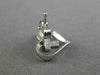 ESTATE .02CT DIAMOND 14KT WHITE GOLD 3D CLASSIC OPEN HEART CROSS STUD EARRINGS