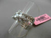 ESTATE 1.12CT ROUND & BAGUETTE DIAMOND 18KT WHITE GOLD CRISS CROSS INFINITY RING
