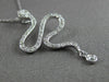 ESTATE .21CT ROUND DIAMOND 14K WHITE GOLD CLASSIC HAPPY SNAKE FLOATING PENDANT