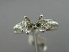 ESTATE .92CT DIAMOND ROUND & BAGUETTE 18KT WHITE GOLD SEMI MOUNT ENGAGMENT RING