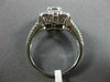 ESTATE LARGE .80CT DIAMOND 18KT WHITE GOLD INVISIBLE SQUARE FLOWER LOVE FUN RING