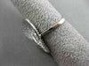 ESTATE LARGE .88CT ROUND DIAMOND 18K WHITE GOLD 3D PAVE INFINITY OVAL LOVE RING