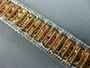 WIDE 22.84CT WHITE & PINK DIAMOND 18KT WHITE & ROSE GOLD CLUSTER TENNIS BRACELET