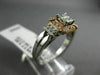 WIDE .50CT ROUND & BAGUETTE DIAMOND 14KT WHITE & ROSE GOLD HALO ENGAGEMENT RING