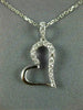 ESTATE .20CT DIAMOND 18KT WHITE GOLD 3D SIDEWAYS HEART FLOATING LOVE PENDANT