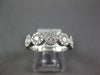 ESTATE .97CT DIAMOND 18K WHITE GOLD HALO SEMI ETERNITY INFINITY ANNIVERSARY RING