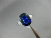 3.07CT TRILLION DIAMOND & OVAL SAPPHIRE 18KT WHITE GOLD 3 STONE ENGAGEMENT RING
