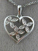 ESTATE .03CT DIAMOND 14K WHITE GOLD FLOWER BUTTERFLY HEART FLOATING LOVE PENDANT