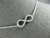 ESTATE .40CT DIAMOND 18KT WHITE GOLD 3D CLASSIC INFINITY LOVE NECKLACE