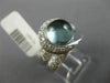 ESTATE WIDE 2.50CT DIAMOND & CABOCHON BLUE TOPAZ 18KT WHITE GOLD LOVE KNOT RING
