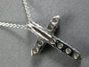 ESTATE .64CT DIAMOND 14KT WHITE GOLD SHARED PRONG INVISIBLE CROSS PENDANT #27677