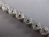 7.04CT DIAMOND & AAA EMERALD 18KT 2 TONE GOLD PEAR SHAPE & ROUND TENNIS BRACELET