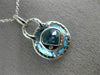 ESTATE LARGE 6.60CT DIAMOND & BLUE TOPAZ 14KT WHITE GOLD HALO ROUND HALO PENDANT