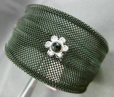 ESTATE .10CT DIAMOND ONYX 18KT WHITE GOLD FLOWER STAINLESS STEEL BANGLE BRACELET