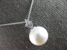 .06CT DIAMOND & AAA SOUTH SEA PEARL 14KT WHITE GOLD FLOWER TRILLION FUN PENDANT