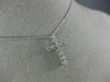 ESTATE .25CT DIAMOND 14KT WHITE GOLD 3D ROUND CLASSIC FLOATING CROSS PENDANT
