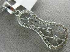 ESTATE .26CT DIAMOND 14KT WHITE GOLD 3D INFINITY ETOILE CRISS CROSS LOVE PENDANT