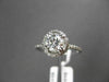 ESTATE 1.17CT ROUND DIAMOND 14KT WHITE GOLD HALO 3D SOLITAIRE ENGAGEMENT RING