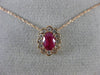ESTATE .71CT DIAMOND & AAA OVAL CUT RUBY 14KT ROSE GOLD FLOWER FLOATING PENDANT