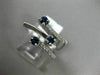 ESTATE WIDE .83CT DIAMOND & AAA SAPPHIRE 18K WHITE GOLD CRISS CROSS ETOILE RING