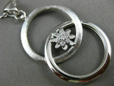 ESTATE LARGE .19CT DIAMOND 18K WHITE GOLD DOUBLE CIRCLE LOVE KNOT FLOWER PENDANT
