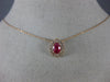 ESTATE .71CT DIAMOND & AAA OVAL CUT RUBY 14KT ROSE GOLD FLOWER FLOATING PENDANT