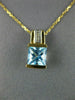 ESTATE 1.46CT DIAMOND & AAA BLUE TOPAZ 14KT 2 TONE GOLD ROUND & PRINCESS PENDANT