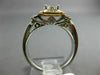 WIDE .50CT ROUND & BAGUETTE DIAMOND 14KT WHITE & ROSE GOLD HALO ENGAGEMENT RING