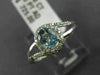ESTATE .48CT DIAMOND & AAA OVAL CUT AQUAMARINE 14KT WHITE GOLD 3D LOVE KNOT RING