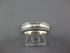 ESTATE LEVIAN .70CT DIAMOND 18KT WHITE GOLD 3D ROUND & BAGUETTE ANNIVERSARY RING