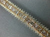 ESTATE WIDE 11.12CT WHITE & PINK DIAMOND 18KT WHITE & ROSE GOLD TENNIS BRACELET