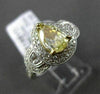 ESTATE 1.64CT FANCY YELLOW DIAMOND 18K TWO TONE GOLD DOUBLE HALO ENGAGEMENT RING