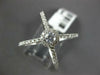 ESTATE LARGE .63CT DIAMOND 14KT WHITE GOLD ROUND HALO CRISS CROSS INFINITY RING