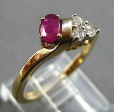 .45CT DIAMOND & AAA RUBY 14KT YELLOW GOLD OVAL & ROUND CRISS CROSS RING #27660