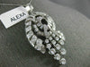 ANTIQUE EXTRA LARGE 5.0CT DIAMOND ROUND & BAGUETTE PLATINUM SWIRL LOVE NECKLACE