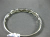 ESTATE WIDE 1.45CT DIAMOND 18KT WHITE GOLD INFINITY FLOWER LOVE BANGLE BRACELET