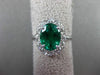 ESTATE LARGE 2.39CT DIAMOND & EMERALD 18KT WHITE GOLD OVAL HALO ENGAGEMENT RING