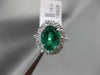 ESTATE LARGE 2.39CT DIAMOND & EMERALD 18KT WHITE GOLD OVAL HALO ENGAGEMENT RING