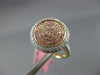 ESTATE WIDE .69CT WHITE & PINK DIAMOND 18KT WHITE & ROSE GOLD 3D CIRCULAR RING