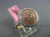 ESTATE WIDE .69CT WHITE & PINK DIAMOND 18KT WHITE & ROSE GOLD 3D CIRCULAR RING
