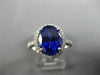 ESTATE LARGE 4.78CT DIAMOND & AAA TANZANITE 18KT WHITE GOLD HALO ENGAGEMENT RING