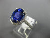 ESTATE LARGE 4.78CT DIAMOND & AAA TANZANITE 18KT WHITE GOLD HALO ENGAGEMENT RING
