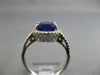 ESTATE LARGE 4.78CT DIAMOND & AAA TANZANITE 18KT WHITE GOLD HALO ENGAGEMENT RING