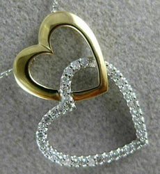 ESTATE .10CT DIAMOND 14KT 2 TONE GOLD DOUBLE HEART JOURNEY FLOATING LOVE PENDANT