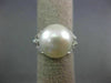 ESTATE LARGE .54CT ROUND DIAMOND & AAA SOUTH SEA PEARL 18KT WHITE GOLD LOVE RING
