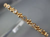 ESTATE 1.50CT DIAMOND 14KT ROSE GOLD FILIGREE MILGRAIN ETERNITY BANGLE BRACELET