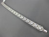 LARGE 7.05CT ROUND & BAGUETTE DIAMOND 18KT WHITE GOLD 3D CLUSTER TENNIS BRACELET