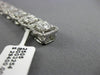 LARGE 7.05CT ROUND & BAGUETTE DIAMOND 18KT WHITE GOLD 3D CLUSTER TENNIS BRACELET