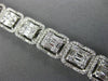 LARGE 7.05CT ROUND & BAGUETTE DIAMOND 18KT WHITE GOLD 3D CLUSTER TENNIS BRACELET